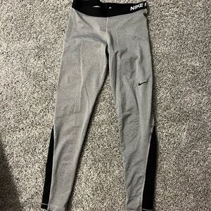 Women’s black and grey Nike pro leggings.